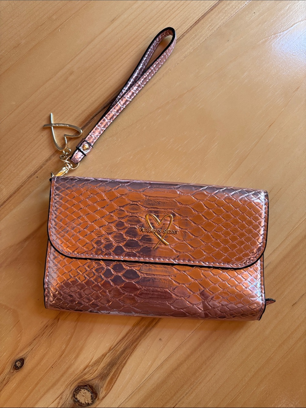 Michele Copper Metallic Embossed Wristlet Clutch